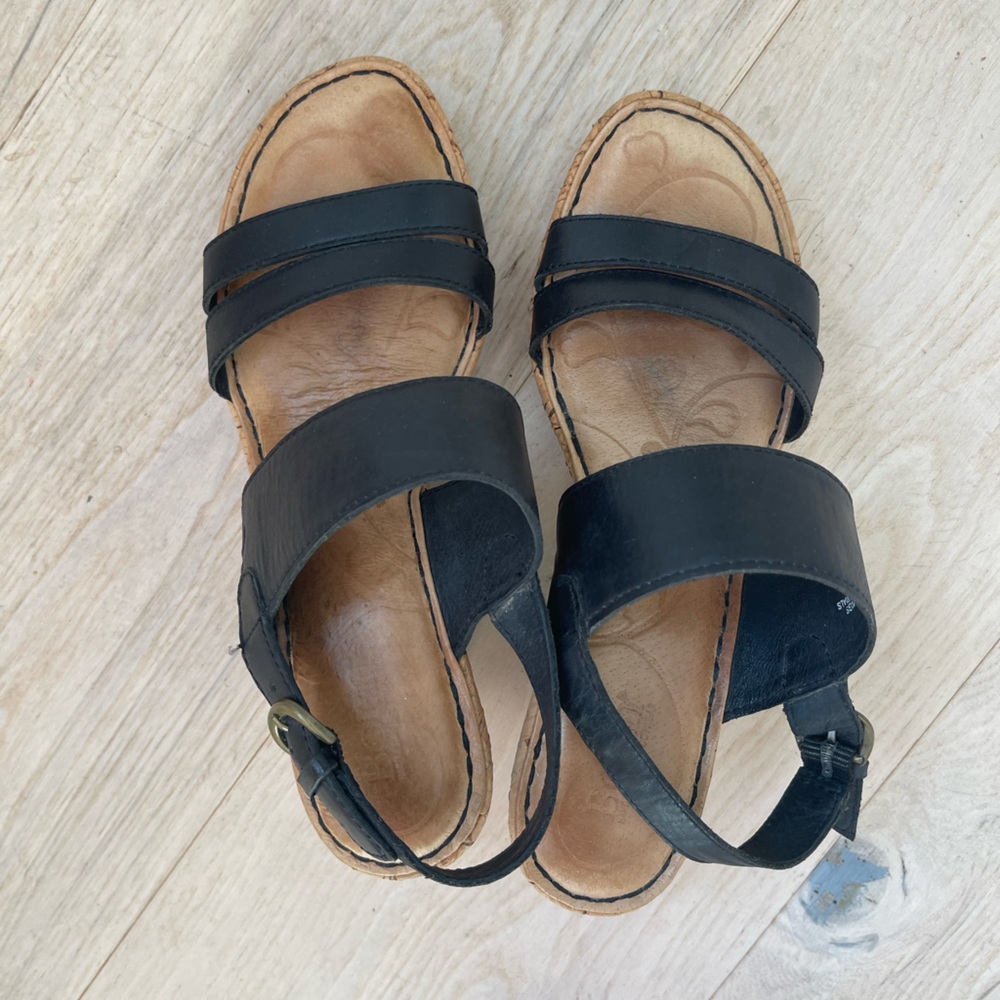 Born size 7 black wedge sandals.